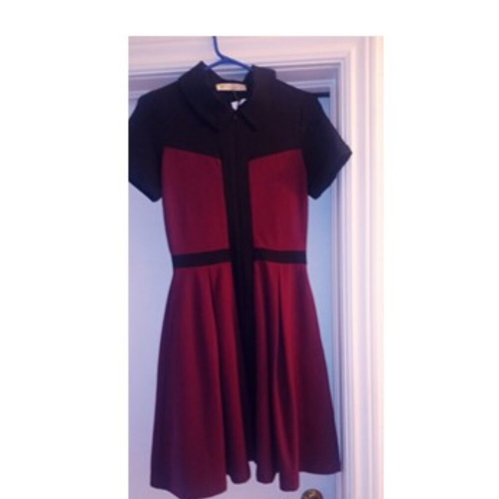MARIGOLD designer dress with label. Brand new. Burgundy plum color.